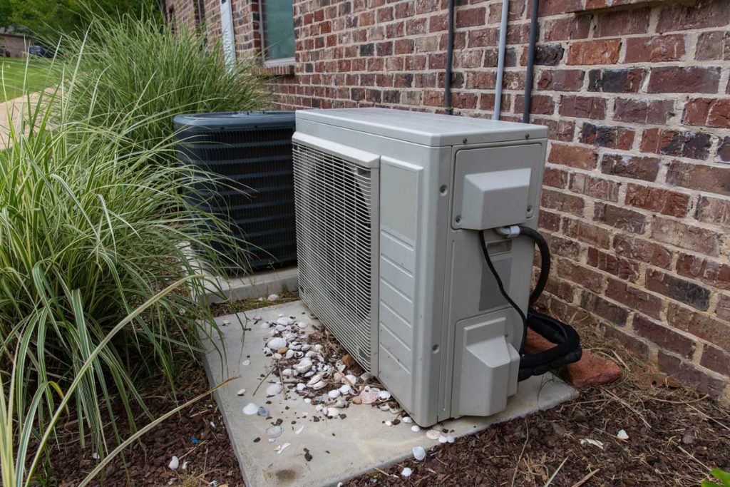 Air source heat pump installation in a garden