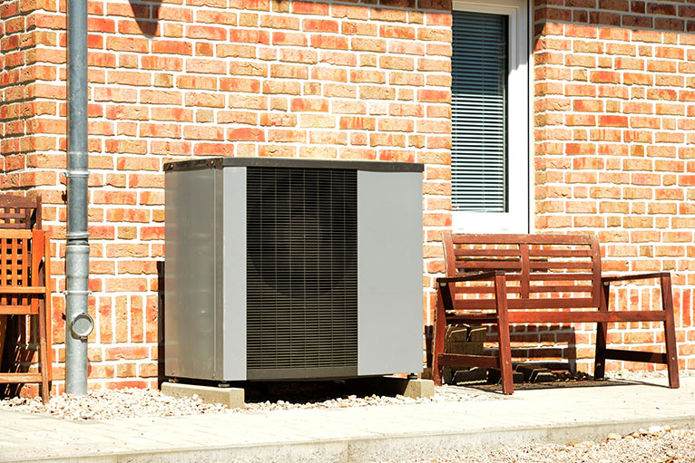 Heat pump grants installation outside a house