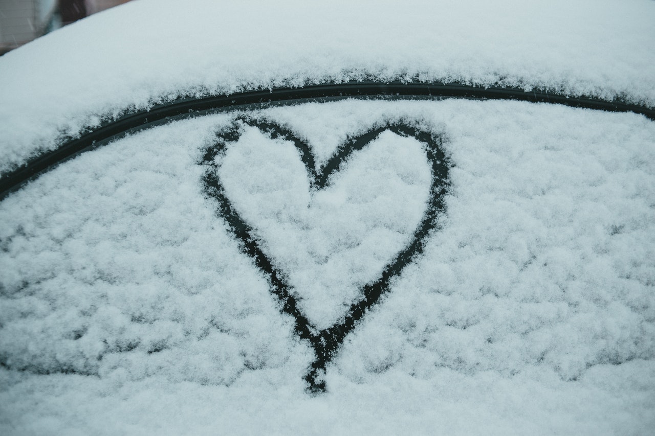 Snowy window from person who has saved money on their heating bills