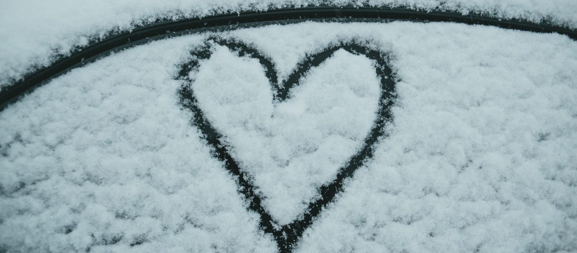 Snowy window from person who has saved money on their heating bills